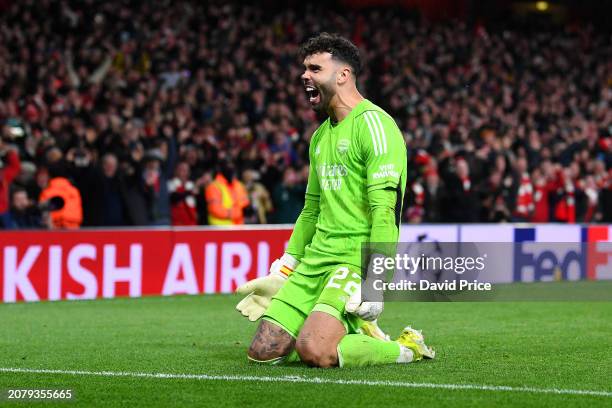 David Raya of Arsenal celebrates after making the match-winning save from the fourth penalty from Galeno of FC Porto in the penalty shoot out during...