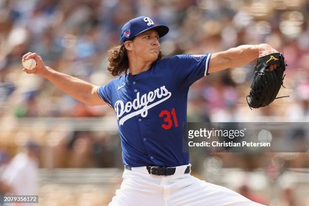 Starting pitcher Tyler Glasnow of the Los Angeles Dodgers pitches against the San Francisco Giants during the first inning of the MLB spring game at...