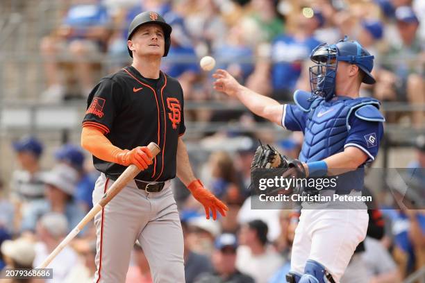 Matt Chapman of the San Francisco Giants strikes out against the Los Angeles Dodgers during the second inning of the MLB spring game at Camelback...