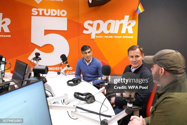 British Prime Minister Rishi Sunak and Chancellor Jeremy Hunt check out studio equipment during a visit to support a multimillion-pound project to...