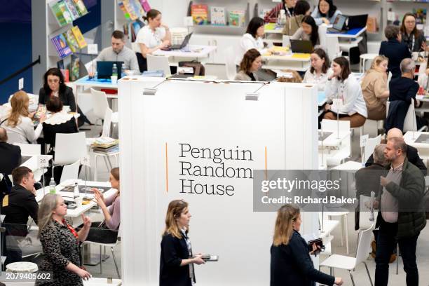 Meetings and book deals on the Penguin Random House book trade stand during the third and final day of the London Book Fair at the Olympia Exhibition...