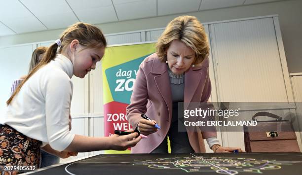 Queen Mathilde of Belgium pictured during a royal visit to the children's and youth department of the psychiatric hospital 'Het Medisch Centrum...