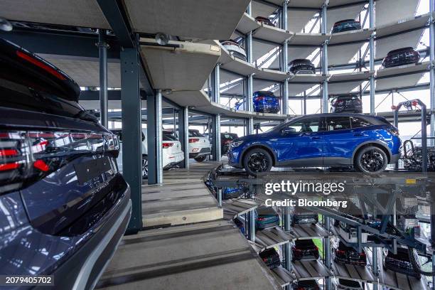 Electric vehicle inside of the Autostadt delivery tower at the Volkswagen AG headquarters and auto plant complex in Wolfsburg, Germany, on Thursday,...