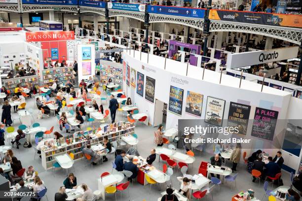 Meetings and book deals at the Hachette book trade stand during the third and final day of the London Book Fair at the Olympia Exhibition Hall, on...