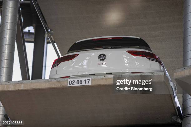 Golf GTI inside of the Autostadt delivery tower at the Volkswagen AG headquarters and auto plant complex in Wolfsburg, Germany, on Thursday, March...