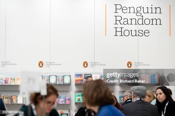 Meetings and book deals on the Penguin Random House book trade stand during the third and final day of the London Book Fair at the Olympia Exhibition...