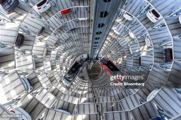 Electric vehicles inside of the Autostadt delivery tower at the Volkswagen AG headquarters and auto plant complex in Wolfsburg, Germany, on Thursday,...