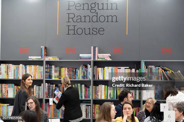 Meetings and book deals on the Penguin Random House book trade stand during the third and final day of the London Book Fair at the Olympia Exhibition...