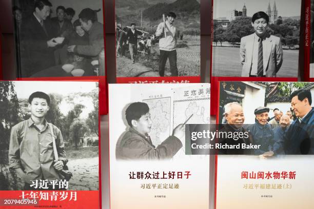 Display of biographies recounting the early political life and times of Chinese General Secretary Xi Jinping are displayed at the London Book Fair at...