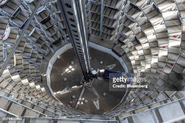 Touran inside of the Autostadt delivery tower at the Volkswagen AG headquarters and auto plant complex in Wolfsburg, Germany, on Thursday, March 14,...