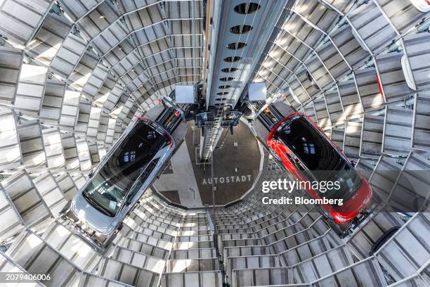 Electric vehicles inside of the Autostadt delivery tower at the Volkswagen AG headquarters and auto plant complex in Wolfsburg, Germany, on Thursday,...