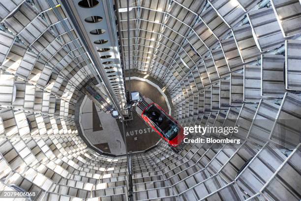 Electric vehicle inside of the Autostadt delivery tower at the Volkswagen AG headquarters and auto plant complex in Wolfsburg, Germany, on Thursday,...