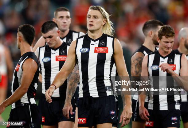 Darcy Moore of the Magpies looks dejected after a loss during the 2024 AFL Round 01 match between the Collingwood Magpies and the Sydney Swans at the...