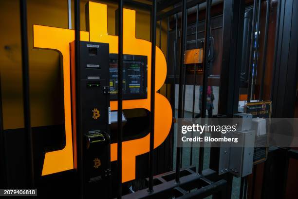 Bitcoin logo on an automated teller machine for cryptocurrencies at a crypto exchange kiosk in Warsaw, Poland, on Thursday, March 14, 2024....