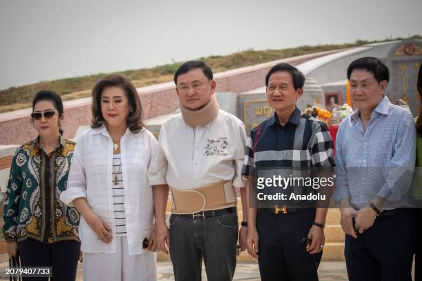 Former PM Thaksin Shinawatra poses for a family photo as he visits his parent's Mausoleum in Chiang Mai, Thailand on March 15, 2024. Thailand's...