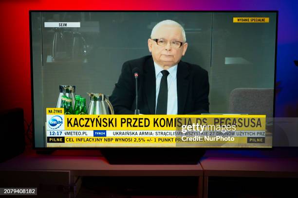 Former de facto Polish leader and head of the Law and Justice party Jaroslaw Kaczynski is seen on television during his testimony at the Pegazus...