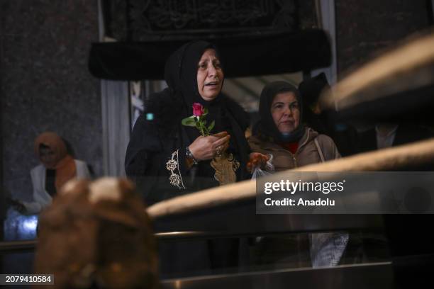 People attend the ceremony as Hirka-i Serif, a mantle which is one of the major relics left to Veysel Karani upon will of Prophet Muhammed, is opened...