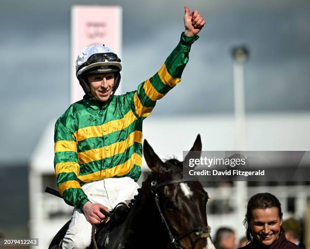 Gloucestershire , United Kingdom - 15 March 2024; Jockey Mark Walsh celebrates aboard Majborough after winning the JCB Triumph Hurdle on day four of...