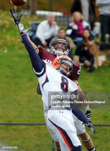 Union's Joshua Rose defends a pass over Hobart's Yosh Karbowniczak during their men's college football game on Saturday Nov. 2, 2013 in Schenectady,...