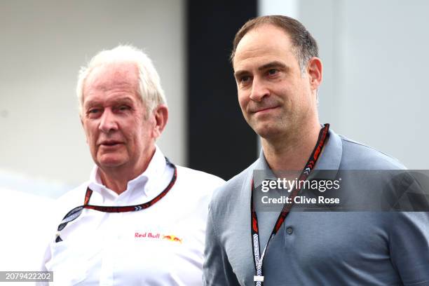 Oracle Red Bull Racing Team Consultant Dr Helmut Marko and Oliver Mintzlaff, Managing Director of Red Bull GmbH walk in the Paddock prior to the F1...