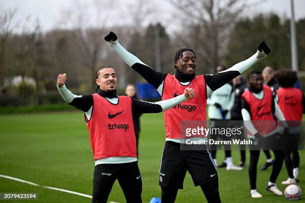 Malo Gusto and Axel Disasi of Chelsea during a training session at Chelsea Training Ground on March 15, 2024 in Cobham, England.