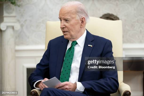 President Joe Biden during a meeting with Leo Varadkar, Ireland's prime minister, not pictured in the Oval Office of the White House in Washington,...