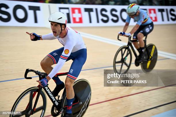 William Perrett of Britain celebrates after his win at the men's elimination race event during the Track Cycling Nations Cup in Hong Kong on March...