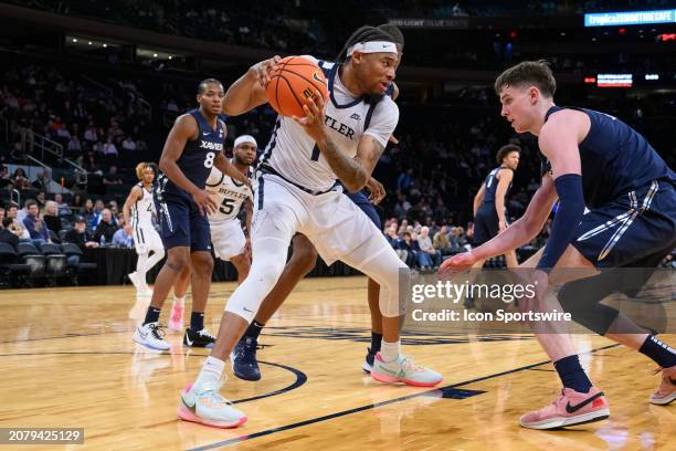 Butler Bulldogs center Jalen Thomas grabs a loose ball in the lane during the Big East Tournament men's college basketball game between the Butler...