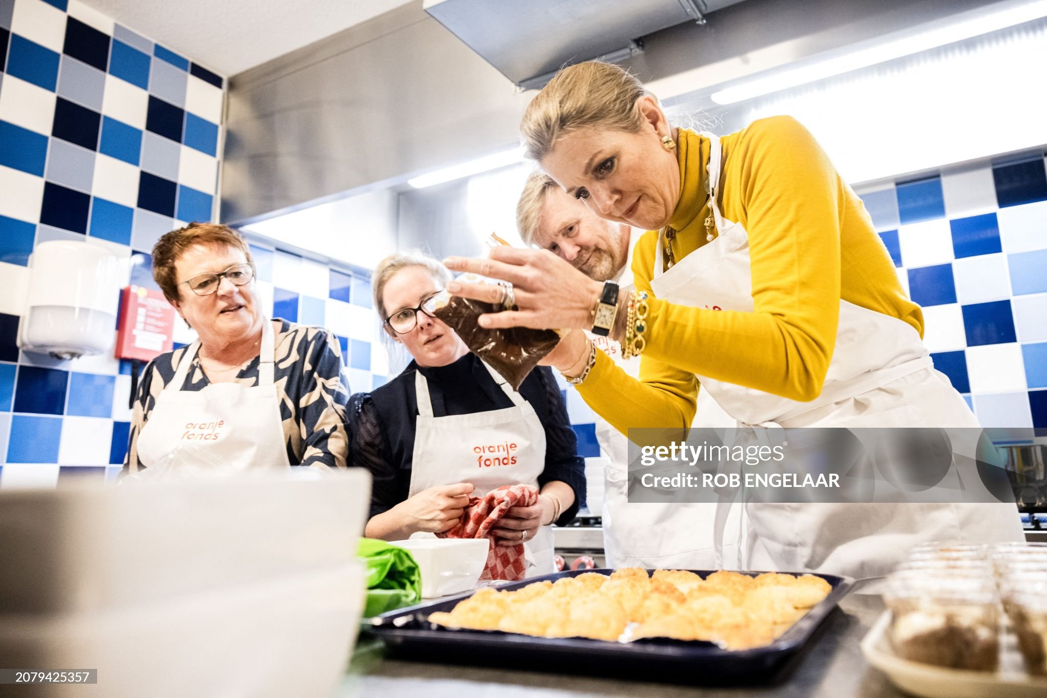 netherlands-royals-queen-maxima-volunteer-in-a-kitchen-during-the-20th-edition-of-nldoet-the.jpg?s=2048x2048&w=gi&k=20&c=lbsed2GdhyDebC4fa9JD9HH8Wa-KrtGTCQq2x77g2_A=