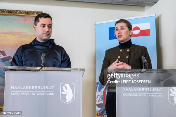 Greenlandic Prime Minister Mute B Egede and Danish Prime Minister Mette Frederiksen address a press conference after signing an agreement on the...