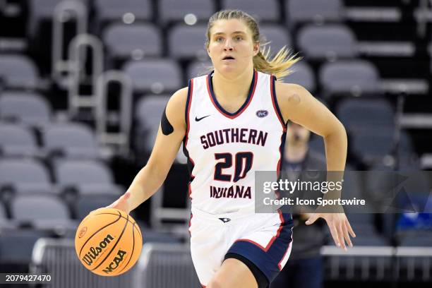 Southern Indiana Screaming Eagles Guard Vanessa Shafford dribbles during the Ohio Valley Conference Championship game between the Southern Indiana...