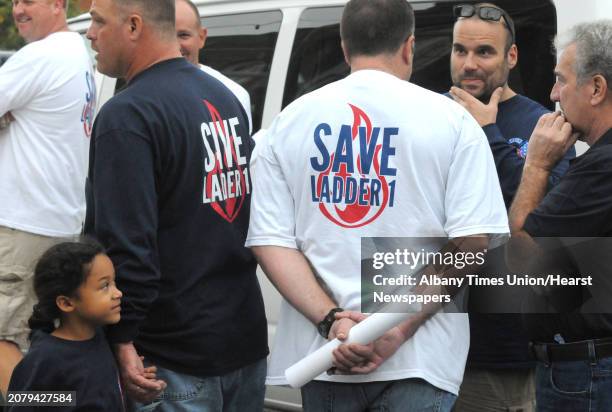 Albany Firefighters gather outside the John J. Howe Library prior to Mayor Kathy Sheehanâs town hall meeting on the city budget Wednesday Oct. 15,...