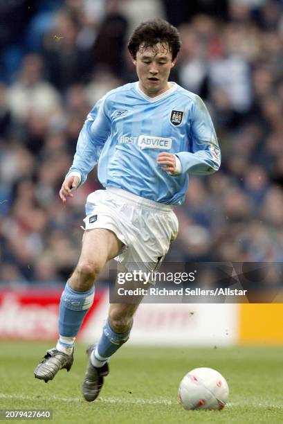 Sun Jihai of Manchester City on the ball during the Fa Cup 4th Round match between Manchester City and Tottenham Hotspur at City Of Manchester...