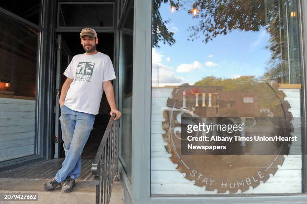 Kevin Blodgett in front of his new bar called The Shop on Friday Oct. 10, 2014 in Troy, N.Y. A 35,000-square-foot Troy building that was home to the...
