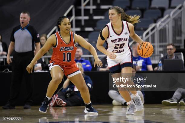 Southern Indiana Screaming Eagles Guard Vanessa Shafford dribbles as UT Martin Skyhawks Guard Amari Bonds defends during the Ohio Valley Conference...