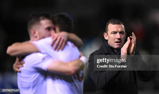 Barnsley manager Neill Collins celebrates victory after the Sky Bet League One match between Carlisle United and Barnsley at Brunton Park on March...