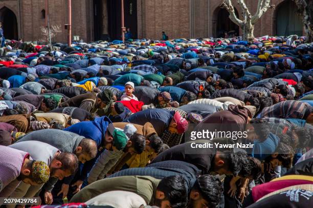 Kashmiri Muslims offer prayers inside the Grand Mosque on the first Friday of the holy Islamic month of Ramadan on March 15, 2024 in Srinagar, Indian...