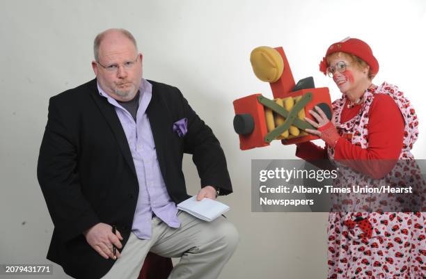 Ladybug the clown and Steve Barnes on Tuesday April 28, 2015 in Colonie, N.Y.