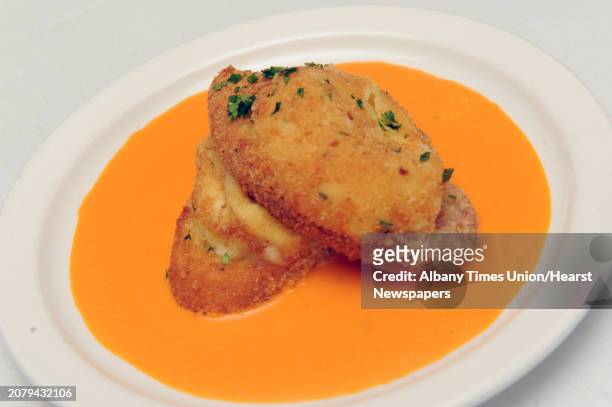 Arancini risotto fritters stuffed with pancetta served over tomato sauce at Rocco's restaurant on Wednesday June 10 2015 in Jonesville, N.Y.