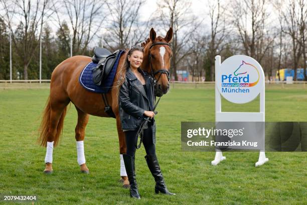 Joelina Drews, new ambassador of Pferd International Muenchen , poses during a photo shoot at Olympia Reitanlage on March 15, 2024 in Munich-Riem,...