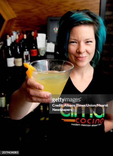 Bartender Amanda Houghtaling with her La Remolacha coctail at Ama Cocina on Thursday Oct. 22, 2015 in Albany, N.Y.