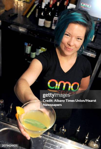 Bartender Amanda Houghtaling with her La Remolacha coctail at Ama Cocina on Thursday Oct. 22, 2015 in Albany, N.Y.