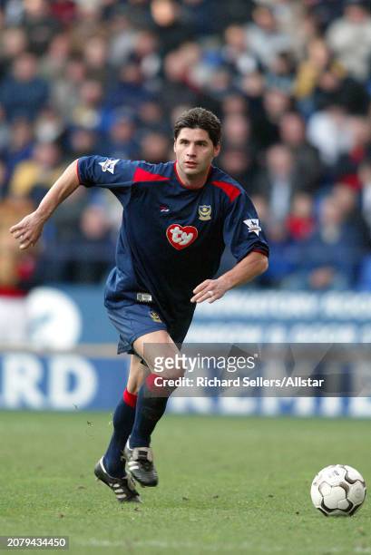 January 17: Dejan Stefanovic of Portsmouth on the ball during the Premier League match between Bolton Wanderers and Portsmouth at Reebok Stadium on...