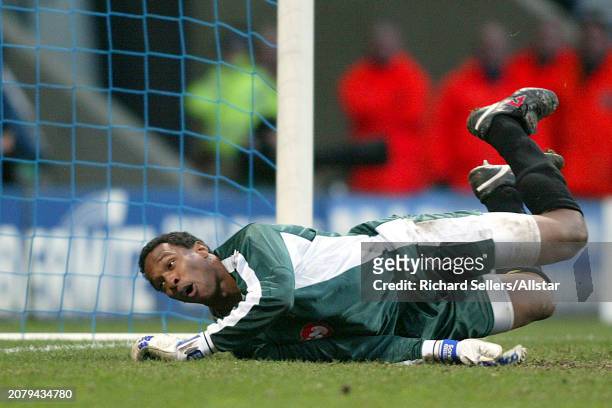 January 17: Shaka Hislop of Portsmouth dives during the Premier League match between Bolton Wanderers and Portsmouth at Reebok Stadium on January 17,...