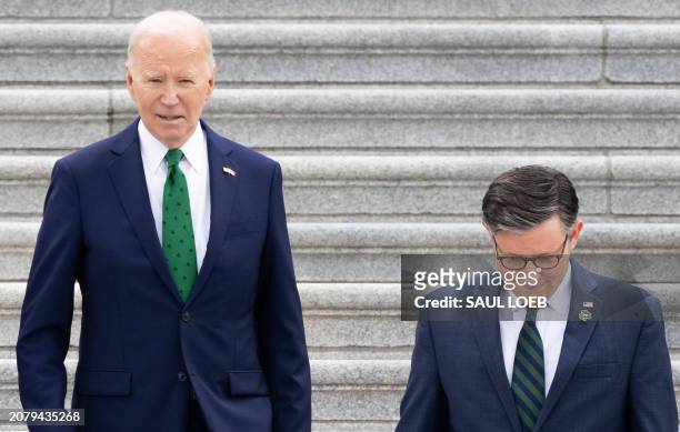 President Joe Biden and Speaker of the House Mike Johnson depart after the annual Friends of Ireland luncheon, at the US Capitol in Washington, DC,...