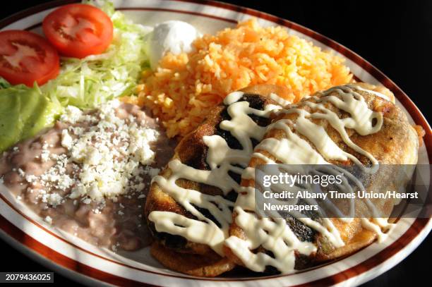 Chiles rellenos at La Mexicana restaurant and grocery store on Tuesday Oct. 1, 2013 in Schenectady, N.Y. ORG XMIT: MER2014102016423297