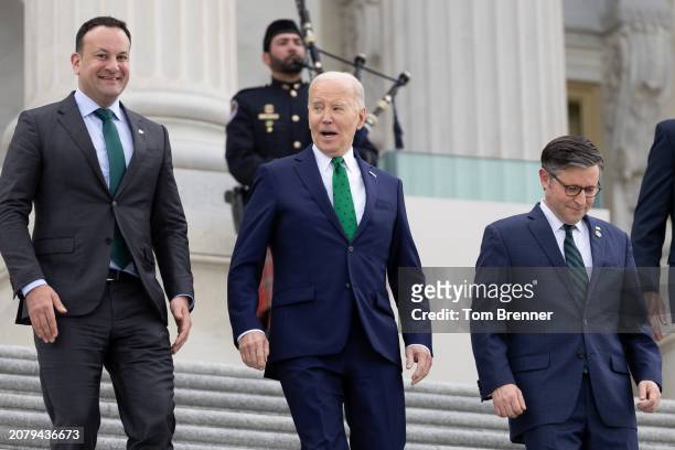 Irish Taoiseach Leo Varadkar, U.S. President Joe Biden and Speaker of the House Mike Johnson walk down the east steps of the House of Representatives...