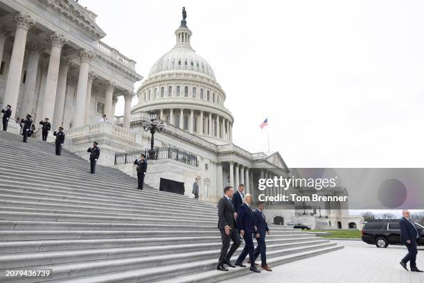 Irish Taoiseach Leo Varadkar, U.S. President Joe Biden and Speaker of the House Mike Johnson walk down the east steps of the House of Representatives...