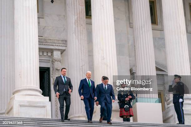 Leo Varadkar, Ireland's prime minister, from left, US President Joe Biden, and US House Speaker Mike Johnson, a Republican from Louisiana, exit the...