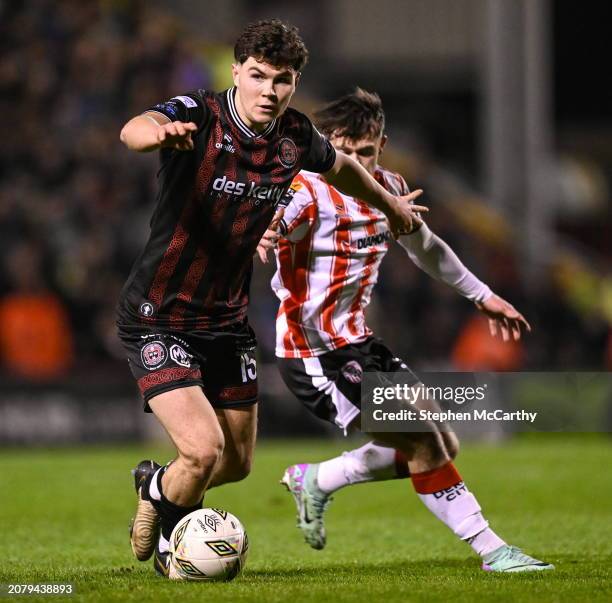 Dublin , Ireland - 15 March 2024; James Clarke of Bohemians in action against Adam O'Reilly of Derry City during the SSE Airtricity Men's Premier...